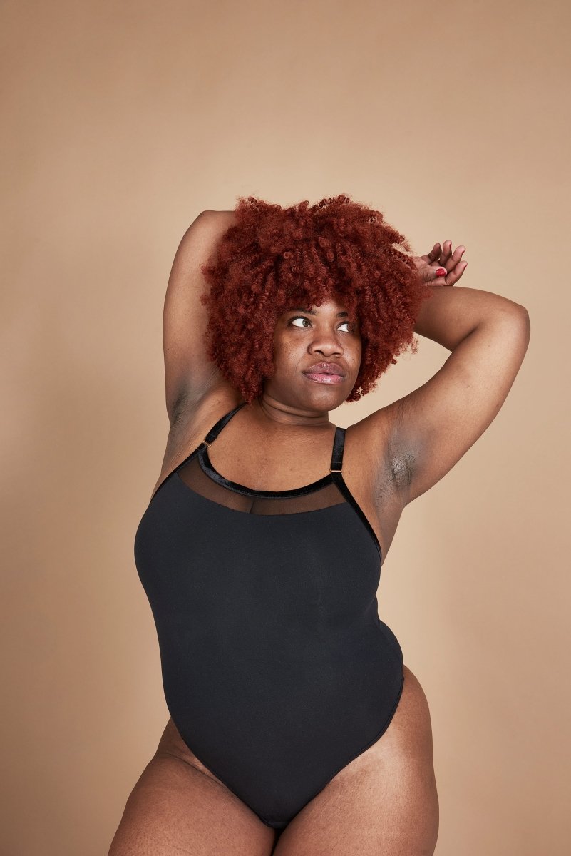 http://theunderargument.com/cdn/shop/products/never-imitate-strappy-bodysuit-strappy-bodysuit-theunderargumentcom-865507.jpg?v=1671480826